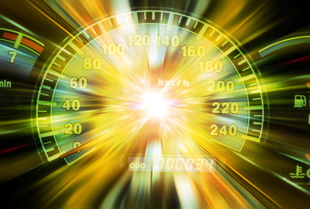 Light effects on a speed meterの写真素材