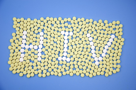 Pills forming the words HIV