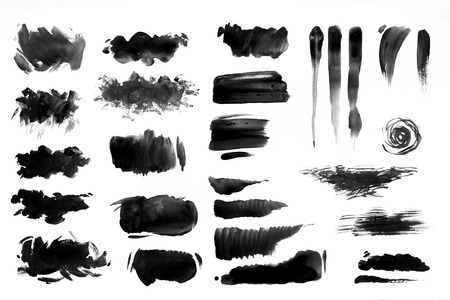 Brush strokes with  paint on paper. backgroundの写真素材