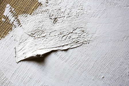 wash of white primer of the canvas. texture for artistsの写真素材