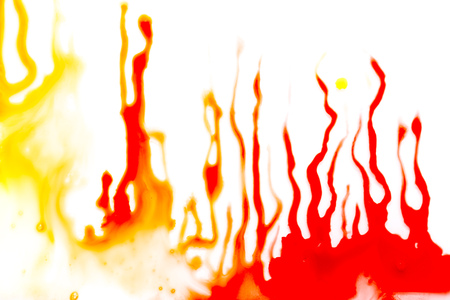 spot of red paint on a white background. stain and sprayの写真素材