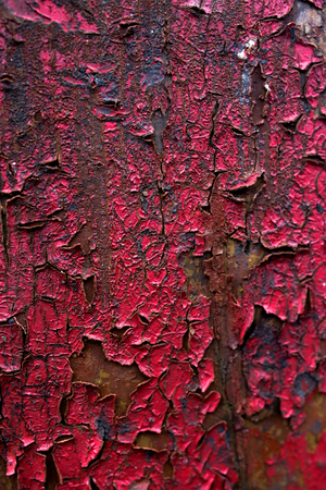 texture of old peeling red paint on the Board. backgroundの写真素材