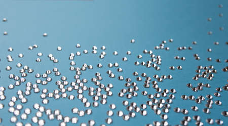 rhinestones on a blue background, blure. design for textの写真素材