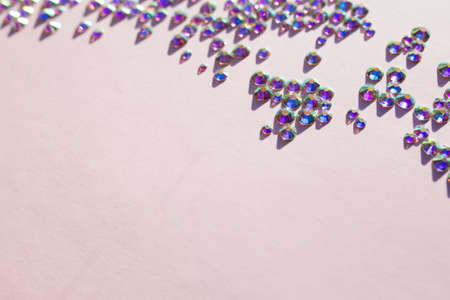 rhinestones on a pink background, blure. design for textの写真素材