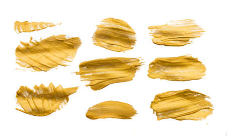 Gold brush strokes with paint on paper
