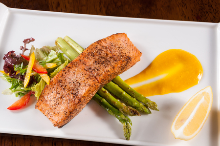 Grilled salmon and vegetablesの写真素材