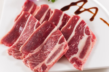 Beef Short Ribs on White Backgroundの写真素材