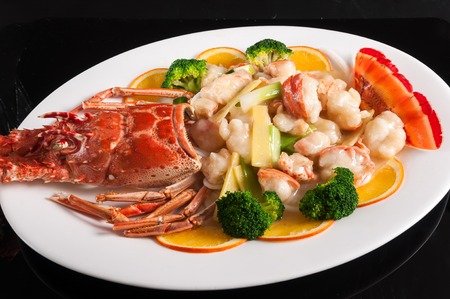 Baked lobster with ginger and scallionの写真素材