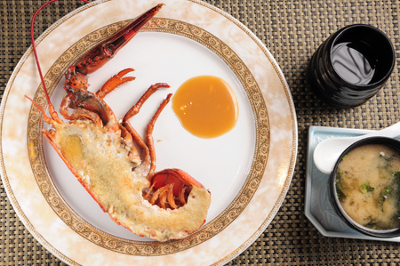 Baked lobster with garlicの写真素材