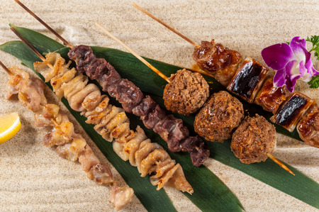 Grilled vegetable and meat skewersの写真素材