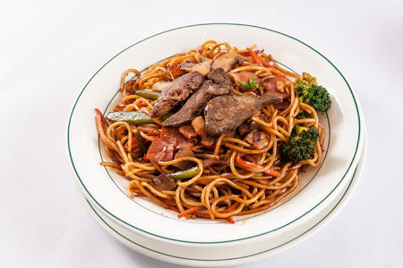 stir-fried noodles with foie gras and bacon, mushroomの写真素材