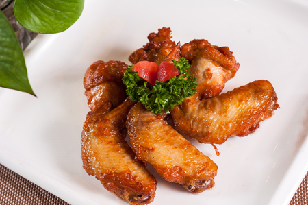 Baked chicken wingsの写真素材