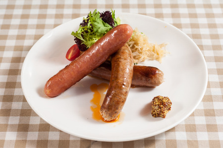 Basil sausage wiht vegetablesの写真素材