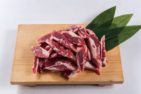cut beef rib on woodの写真素材