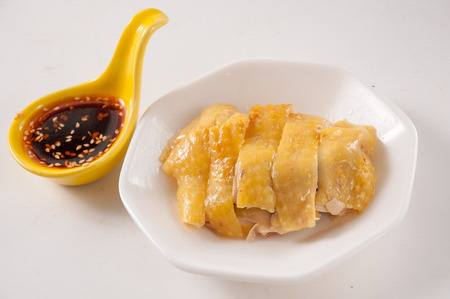 Sliced boiled chicken with capsicolの写真素材