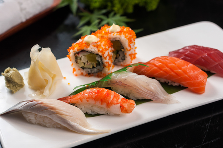 Nigiri Sushi set on a white plateの写真素材