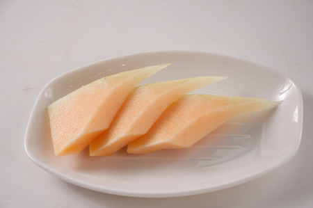 Slices of Hamigua Melon, Hami Melon, Hami Cantaloupe.の写真素材