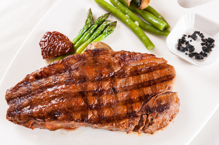 Grilled beefsteak with asparagusの写真素材
