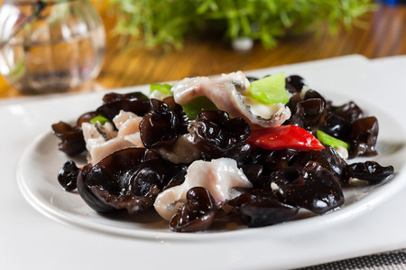 Fried edible fungus and fish filletの写真素材