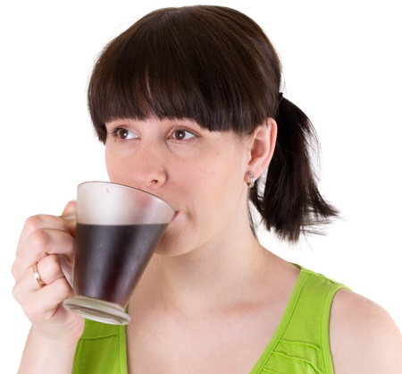 The young woman drinks coffeeの写真素材