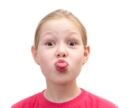 The girl puts out the tongueの写真素材