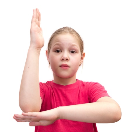 The girl holds a hand upwardsの写真素材