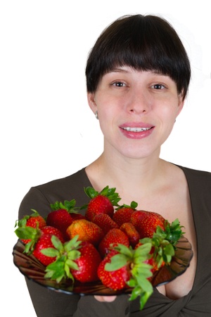young woman with a strawberryの写真素材
