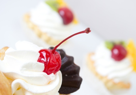 Cake with a cherryの写真素材