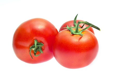 Red tomatoes isolated on whiteの写真素材