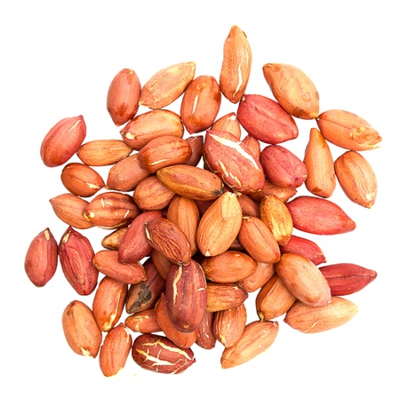 Pile of peanuts with skin isolated on white.の写真素材