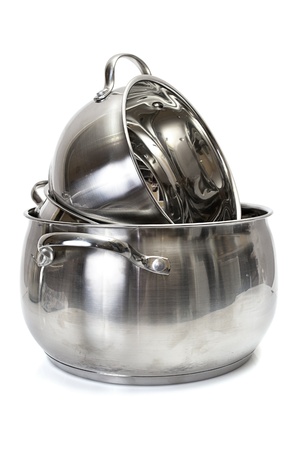 Shiny metal pans isolated on a white backgroundの写真素材
