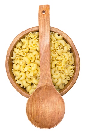 raw pasta in wooden bowl isolated on white backgroundの写真素材