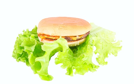 Burger on salad isolated on white background.の写真素材