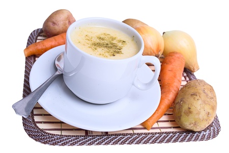 Soup with vegetables on a stand isolated on white background.の写真素材
