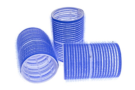 blue curlers isolated on a white backgroundの写真素材