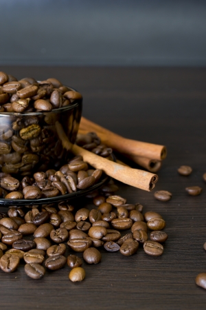 coffee beans, cup, Pots, cinnamon on dark の写真素材