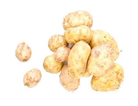 Fresh potatoes on a white の写真素材