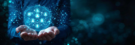 Abstract dark blue background with a businessman can be seen holding four icons.の素材