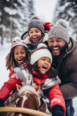 A family is enjoying a sleigh ride through a snowy winter wonderland.の素材