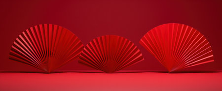 three red fan designs sitting on a red background,の素材
