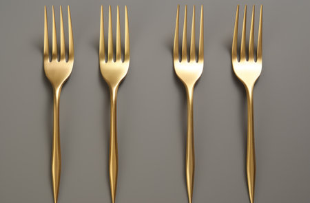 three gold forks and forks iの素材