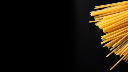 pasta on black background with copy spaceの素材