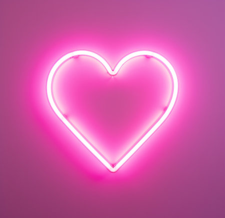 a neo heart sign is lit up on a pink background.の素材