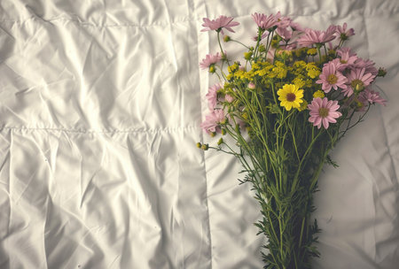 person with flowers holding yellow dress in hand is smiling at camera.の素材