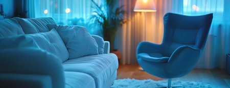the apartment interior contains a white couch and blue chair.の素材