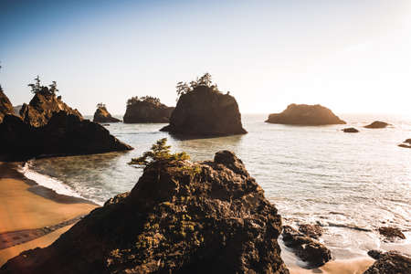 Sunset over Secret Beach rocksの写真素材