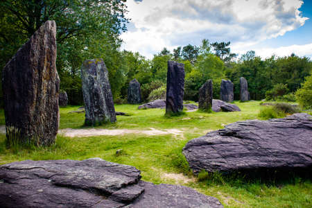 Standing and fallen menhirs near Monteneuf in Brittany, Franceの写真素材