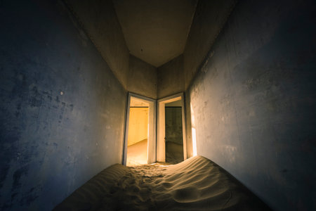 Hallway covered in sand in abandoned Kolmanskopの写真素材