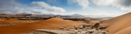 Panoramic view of Sossusvlei dunes in the cloudsの写真素材