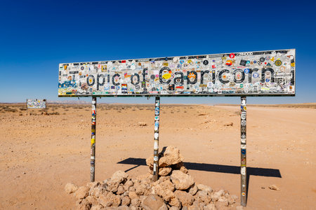 Tropic of Capricorn road sign on a remote track in Namibiaの写真素材